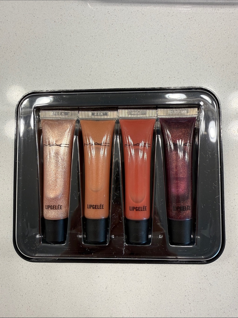 MAC Cosmetics Lipgelée 4-Piece Gloss Set — Champagne, Peach, Coral, Plum NIB